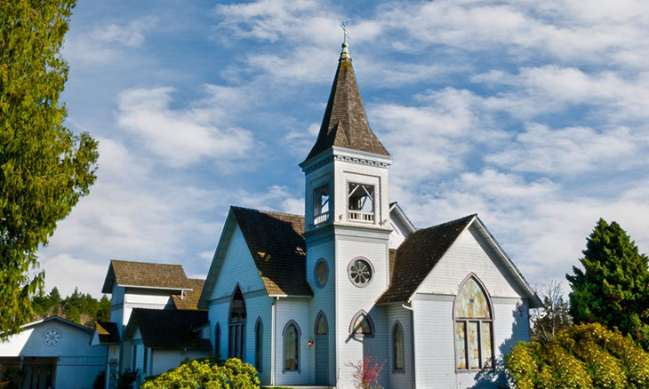 White church with a tall steeple.