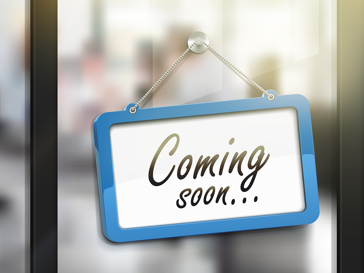 "Sign displaying 'Coming Soon' message."